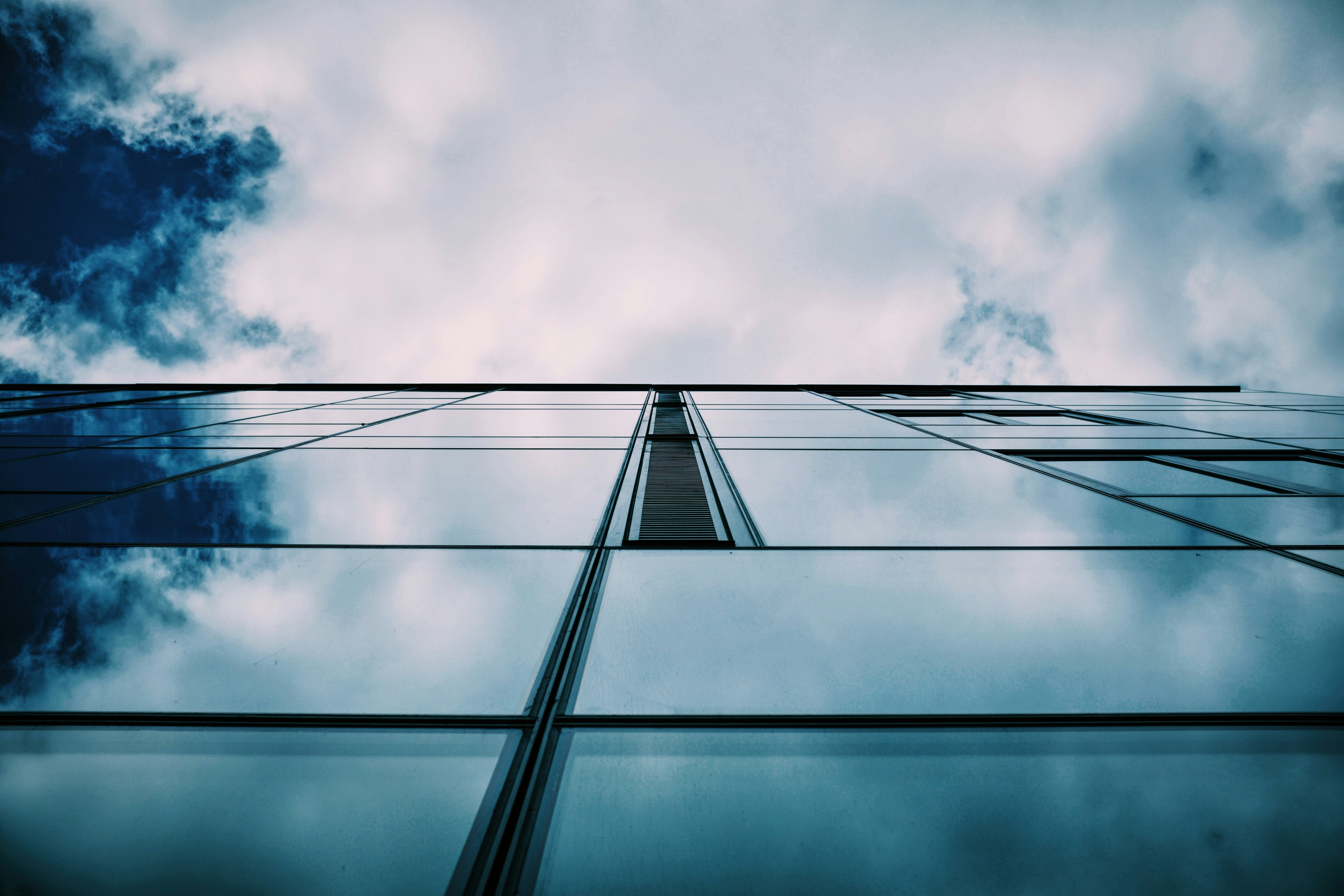 worm's eye view photo of glass building